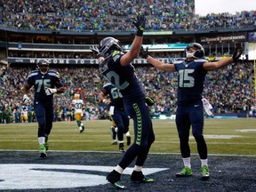 Jermaine Kearse and Luke Willson celebrate the game-winning touchdown in the 2015 NFC Championship Game.