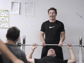 Brendan Gallagher laughs with Milan Lucic during their off-season training session at South Delta Secondary School in Tsawassen.