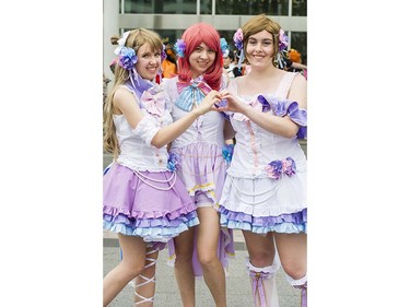 Lauryn Holte as Kotori Minami, Kaitlyn Christensen as Maki Nishikino and Hailey Nermo as Hanayo Koizumi, right to left pose at Anime Revolution, a three-day convention of  activities, exhibits, panels and performances of the popular Japanese-born anime art form in Vancouver Sunday August 7, 2016.