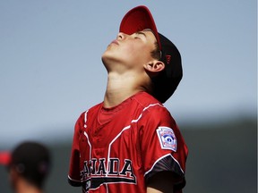 Canada's Stefano Dal Sasso collects himself on the mound after giving up a two-run home run to Mexico's Jose Angel Leal during the third inning of their International elimination baseball game at the Little League World Series tournament in South Williamsport, Pa., on Tuesday. Mexico won 7-1.