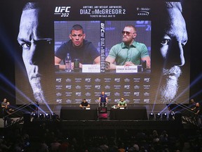 (L to R) Nate Diaz, UFC President Dana White, and Conor McGregor answer questions at the UFC 202 press conference in Las Vegas.