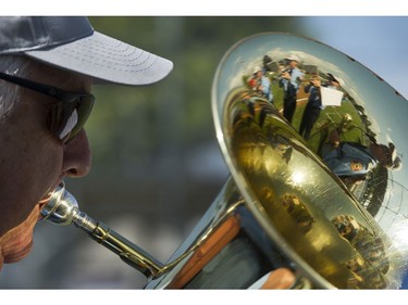 An ensemble  member of the Vancouver Fire and Rescue Services band plays at the Opening ceremonies for the Canadian Little League Championship