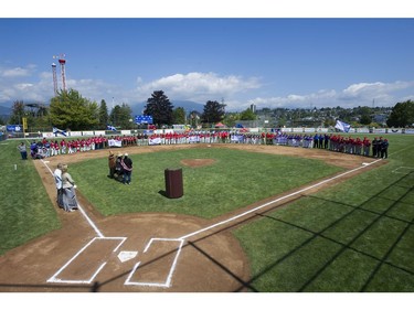 The seven teams competing for the Canadian Little League Championship stand on the field at Richard Saunders Field