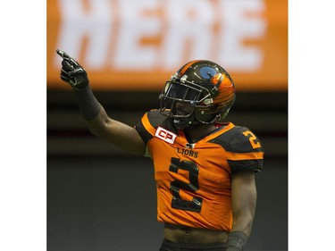 BC Lions #2 Chris Rainey gestures after running the into the end zone against the Hamilton Tiger-Cats.