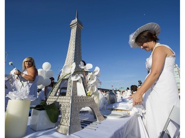 A model of the Eiffel tower adorns a table at Le Diner en Blanc at Concord Pacific Place Vancouver, August 18 2016.
