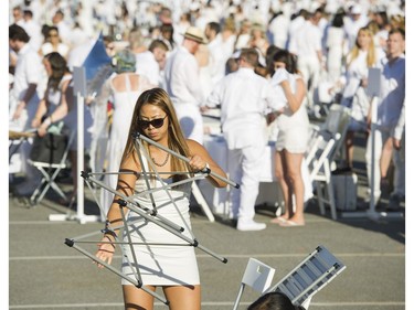 Nina Patel assembles her table at Le Diner en Blanc at Concord Pacific Place Vancouver, August 18 2016.