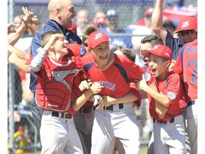 Hastings Community celebrates their 1-0 win over Whalley during 2016 Little League Canadian Championship game at Hastings Park.