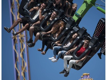 Thousands of people enjoyed the sunshine for the opening of the PNE in Vancouver, BC Saturday, August 20, 2016.