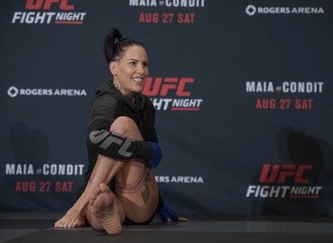 UFC fighter Bec Rawlings stretches at the Hyatt Regency hotel in Vancouver on Thursday. Rawlings is on the main card of UFC on FOX 21 on Saturday at Rogers Arena, taking on Paige VanZant in a women’s strawweight bout.