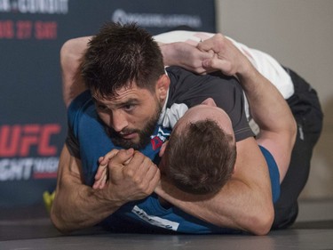 UFC headliner Carlos Condit works out with coach Ricky Lundell at the Hyatt Regency hotel in Vancouver on Thursday. The welterweight will face Demian Maia in the main bout of UFC on FOX 21 on Saturday at Rogers Arena.