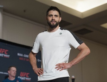 UFC fighter Carlos Condit strikes a pose at the Hyatt Regency hotel in Vancouver on Thursday. The welterweight will face Demian Maia in the main bout of UFC on FOX 21 on Saturday at Rogers Arena.