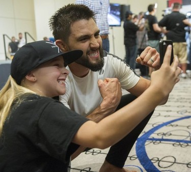 UFC fighter Carlos Condit meets his fans at the Hyatt Regency hotel in Vancouver on Thursday. The welterweight will face Demian Maia in the main bout of UFC on FOX 21 on Saturday at Rogers Arena.