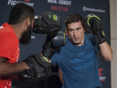 UFC welterweight Demian Maia (right) works out with Ivan Oliveira at the Hyatt Regency hotel in Vancouver on Thursday. Maia takes on Carlos Condit in the headline bout of UFC on FOX 21 on Saturday at Rogers Arena.