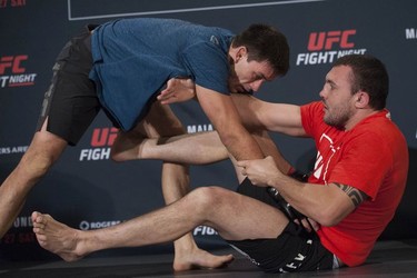 UFC fighter Demian Maia (left) works out with Luiz Cane at the Hyatt Regency hotel in Vancouver on Thursday. Maia takes on Carlos Condit in the headline bout of UFC on FOX 21 on Saturday at Rogers Arena.