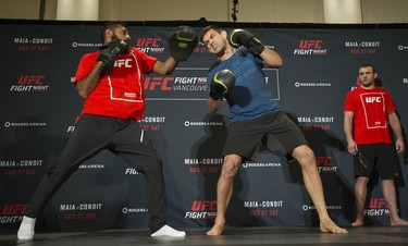UFC fighter Demian Maia (right) works out with Anthony Oliveira at the Hyatt Regency hotel in Vancouver on Thursday. Maia takes on Carlos Condit in the headline bout of UFC on FOX 21 on Saturday at Rogers Arena.