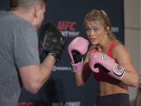 UFC fighter Paige VanZant works out with striking coach Owen Carr at the Hyatt Regency hotel in Vancouver on Thursday. VanZant is on the main card of UFC on FOX 21 on Saturday at Rogers Arena, taking on Bec Rawlings in a women’s strawweight bout.