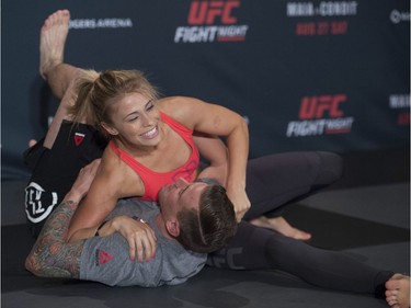 UFC fighter Paige VanZant works out with striking coach Owen Carr at the Hyatt Regency hotel in Vancouver on Thursday. VanZant is on the main card of UFC on FOX 21 on Saturday at Rogers Arena, taking on Bec Rawlings in a women’s strawweight bout.