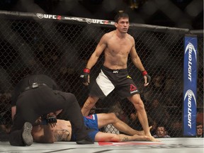 Demian Maia stands over Carlos Condit after beating him at UFC Fight Night at Rogers Arena in Saturdays co-main event. Maia became the first fighter in 10 years to get Condit to tap out.
