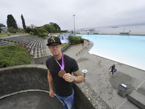 Former Olympian Brent Hayden at Kits Pool in Vancouver this week, wearing the bronze medal he won in the pool at the 2012 London Summer Games.