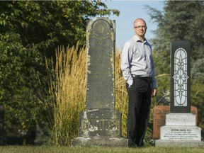 VANCOUVER, BC - SEPTEMBER 14, 2016,  -   Cemetery manager Glen Hodges with old and new at Mountain View Cemetery in Vancouver, BC., September 14, 2016.   revenues have risen dramatically at the cemetery since it re-opened several years ago. Income has risen from $200,000 annually to well over $2 million. (Arlen Redekop / PNG photo) (story by Kent Spencer) [PNG Merlin Archive]