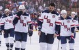 Team USA&#039;s Dustin Byfuglien, centre, Matt Niskanen, left, and Patrick Kane, right, leave the ice after their team lost to Team Czech Republic in World Cup of Hockey action in Toronto, Thursday September 22, 2016. THE CANADIAN PRESS/Mark Blinch