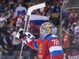 Team Russia goaltender Sergei Bobrovsky celebrates his shut out at the final buzzer as his team beat Team Finland 3-0 in World Cup of Hockey action in Toronto on Thursday, September 22, 2016. THE CANADIAN PRESS/Chris Young