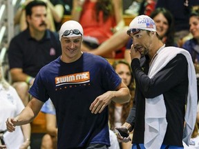 A May 15, 2015, file photo, Ryan Lochte, left, and Michael Phelps talk before the start of the 100-meter butterfly final at the Arena Pro Swim Series meet in Charlotte, N.C. Add Phelps&#039; name to the list of Americans who were less than amused by teammate Lochte&#039;s post-competition, early morning drunken antics at the Rio Olympics. &ampquot;I did have a talk with him about two days before about not doing anything bad,&ampquot; said Phelps, who retired after the Summer Games as the most-decorated Olympian of all ti