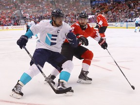 TORONTO, ON - SEPTEMBER 21: Anze Kopitar #11 of Team Europe attempts to get around Drew Doughty #8 of Team Canada during the first period at the World Cup of Hockey tournament at the Air Canada Centre on September 21, 2016 in Toronto, Canada.  (Photo by Bruce Bennett/Getty Images)