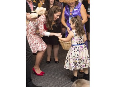 VANCOUVER, BC - SEPTEMBER 25:  Catherine, Duchess of Cambridge speaks to a young girl during a visit to Sheway, a charity that helps vulnerable mothers battling issues such as addiction, during their Royal Tour of Canada on September 25, 2016 in Vancouver, Canada.