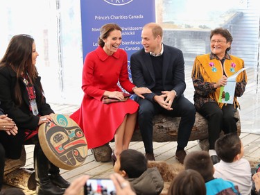Catherine, Duchess of Cambridge and Prince William, Duke of Cambridge sit as stories are read to children at McBride Museum during the Royal Tour of Canada on September 28, 2016 in Whitehorse, Canada.