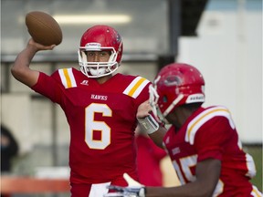 Quarterback Shawn Lal and the W.J. Mouat Hawks of Abbotsford met Coquitlam's Centennial Centaurs in conference play on Friday. (PNG file photo by Gerry Kahrmann)