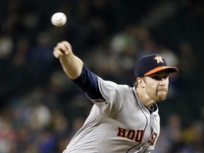 Houston Astros starting pitcher Collin McHugh throws to a Seattle Mariners batter during the fourth inning of a baseball game Friday, Sept. 16, 2016, in Seattle.