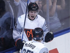 Austen Matthews celebrates his game opening goal with Connor McDavid as Team North America plays Sweden in World Cup of Hockey in Toronto on Wednesday September 21, 2016. Michael Peake/Toronto Sun/Postmedia Network