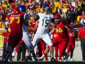 UBC Thunderbirds quarterback Michael O'Connor throws a pass against the University of Calgary Dinos during CIS Canada West football action at McMahon Stadium in Calgary on Friday.