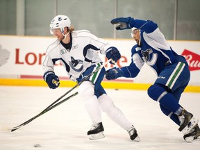 Philip Larsen skates during Day 1 of the Canucks training camp.