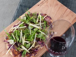 Creative flatbread and a glass of Syrah at Black Hills Estate Winery, one of the many wineries along Black Sage Road in the South Okanagan.