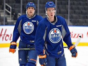 Connor McDavid and Milan Lucic are slated to play together tonight for the Oilers against the Canucks at Rogers Arena. (Canadian Press photo.)