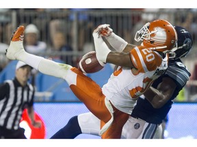 B.C. Lions defensive back Keynan Parker prevents Argonauts wide receiver Tori Gurley from making a touchdown catch in Toronto last Wednesday.
