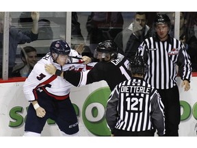 Darian Skeoch, left, shown with Lethbridge fighting against former Giant Taylor Crunk, is listed at 6-foot-4 and 220 pounds.