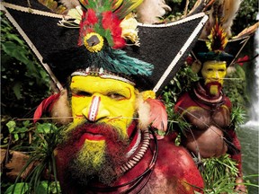 Men in New Guinea's Huli people of the Tari Valley take part in ceremony to become a man, after three years of seclusion. Photo from Wade Davis: Photographs, by Wade Davis, launching October 23. Published by Douglas & McIntyre.