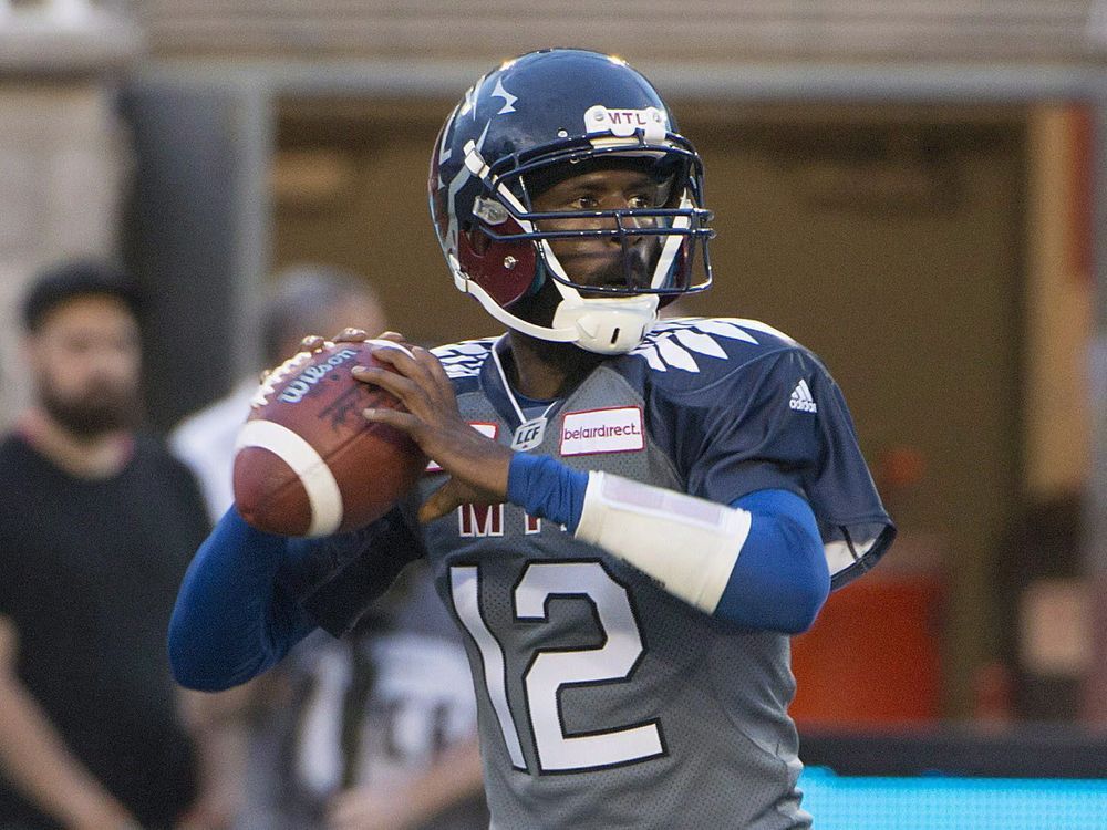 Montreal Alouettes quarterback Rakeem Cato searches downfield for a receiver during first half CFL football action in Montreal on July 15, 2016. Montreal Alouettes coach and GM Jim Popp hopes a quarterback switch will work as well for his team as it has for B.C. counterpart Wally Buono. With Montreal (3-7) last in the East Division standings and the team's offence in need of a spark, Popp decided this week to sit veteran quarterback Kevin Glenn and give youngster Rakeem Cato the start for Friday's game against the Lions (7-3) at BC Place.