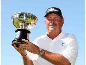 Dave Barr, shown with his trophy after winning at the Canadian PGA seniors championship in 2007, bested the late, great Arnold Palmer in Kelowna in the 1980s.