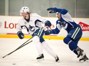 Philip Larsen outskates a teammate during Day 1 of the Canucks training camp in Whistler.