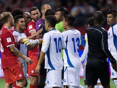 Canada and El Salvador players exchange words during second half FIFA World Cup qualifying soccer action in Vancouver, B.C., on Tuesday September 6, 2016.