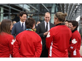 Prime Minister Justin Trudeau and Prince William meet the Olympic bronze-medal-winning Canadian women's sevens rugby team in Vancouver on Sunday. photo: Adam Scotti — Prime Minister's Office