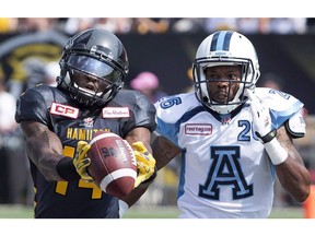 Former Hamilton Tiger-Cats wide receiver Terrell Sinkfield, left, hopes to catch on quickly with the Lions. He'll make his first start for B.C. on Friday in Edmonton.