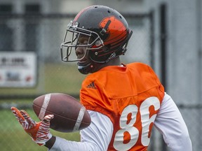 B.C. Lions receiver Courtney Taylor juggles a pass during the CFL team's practice at its facility in Surrey last month.