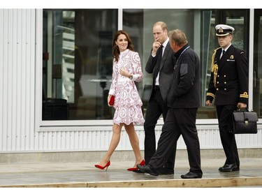 The Duke and Duchess of Cambridge are escorted down to Harbour Air Terminal in Victoria, B.C., Sunday, Sept 25, 2016 where they departed on a float plane on their way to Vancouver for planned events.