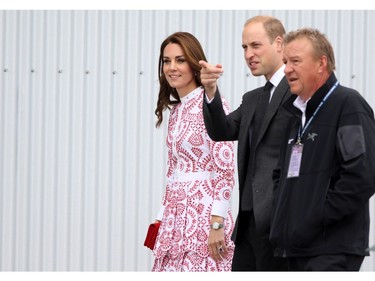 The Duke and Duchess of Cambridge are escorted down to Harbour Air Terminal in Victoria, B.C., Sunday, Sept 25, 2016 where they departed on a float plane on their way to Vancouver for planned events.