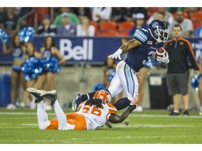 Lions linebacker Solomon Elimimian brings down Brandon Whitaker during B.C.'s 16-13 victory over the Argos Wednesday in Toronto. Elimimian had a team-record 14 tackles in the game.